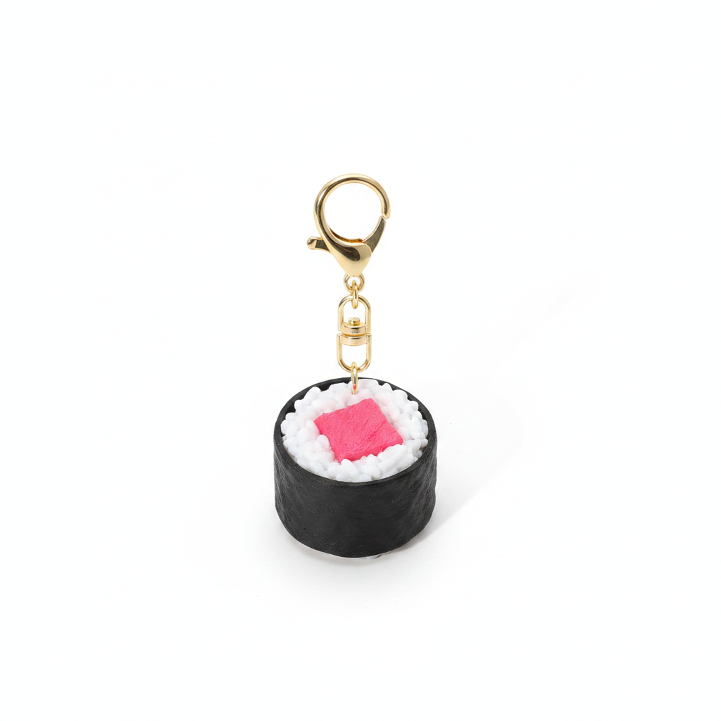 Mini Sushi Roll Clicker Fidget Keychain Bag Charms - Wholesale 12-Pack and other Wholesale sushi for your store trending on Faire.
