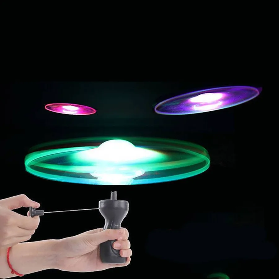 Pull line Rotating Led Flying Saucer Kids Toy — wholesale Toys & Games by the case