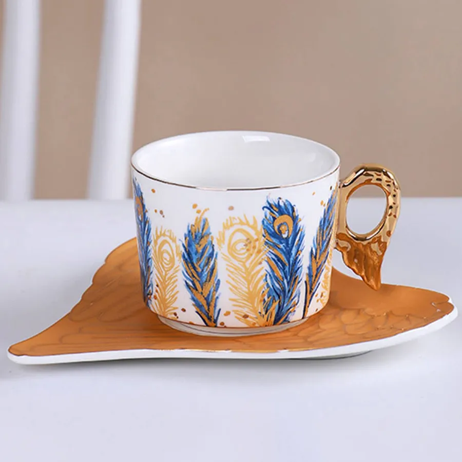 Feather Patterned Ceramic Tea Mug and Saucer Set - Assorted — wholesale Kitchen & Drinkware by the case
