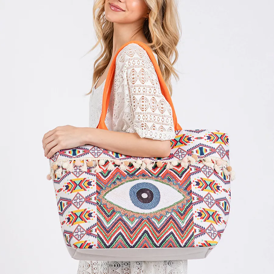 Evil Eye Printed Pom Pom Fringe Tote Bag - Assorted — wholesale Bags & Backpacks by the case